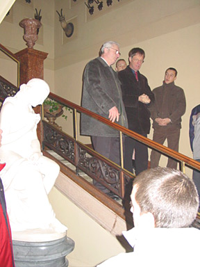 On the monumental staircase the Arch-dule Markus von Habsburg-Lothringen recounts to his visitors the history of his family and of his country