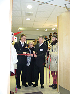 Neeme Rand, Christiane Keller & Louis Robert cutting the ribbon to open the exhibition to the public