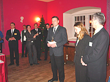 Jaanus Tamkivi in the centre, addresses the guests.