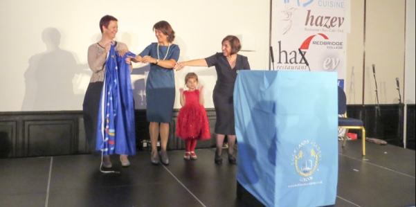 The AEHT flag is passed from the United Kingdom to Belgium