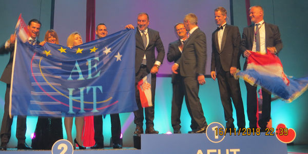 The AEHT flag is handed to Ivo Bilic’s Split team.