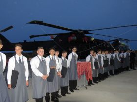 Part of the service team in front of one of the helicopters