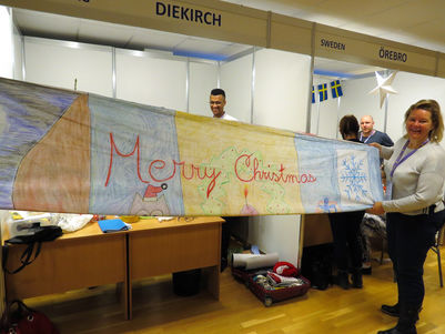 The delegations hard at work decorating their allocated stands