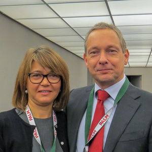 the newly-elected President Remco Koerts with Ana Paula Païs as they leave the meeting room