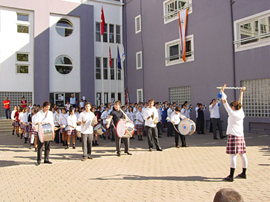 The school’s brass band serenades the visitors
