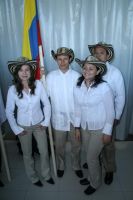 The four Colombian students wearing their traditional costumes. (Photo Sébastien Longhurst)
