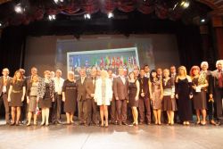 All the national delegates on stage for a family photo