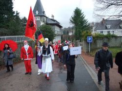 the long line of delegations crosses the fields and the local area