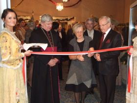 The ribbon is cut by Mgr Wojciech Wolniewicz., Roman Tauber and Christiane Keller 