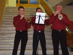 The trio of trumpets plays the European anthem