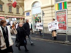 A demonstration by wolf protection activists passes close the AEHT parade
